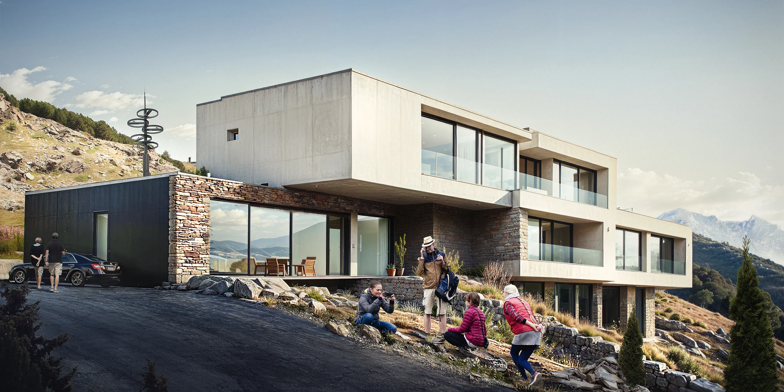 Contemporary hillside villa with large glass windows, surrounded by rocky terrain and people enjoying the outdoor space.